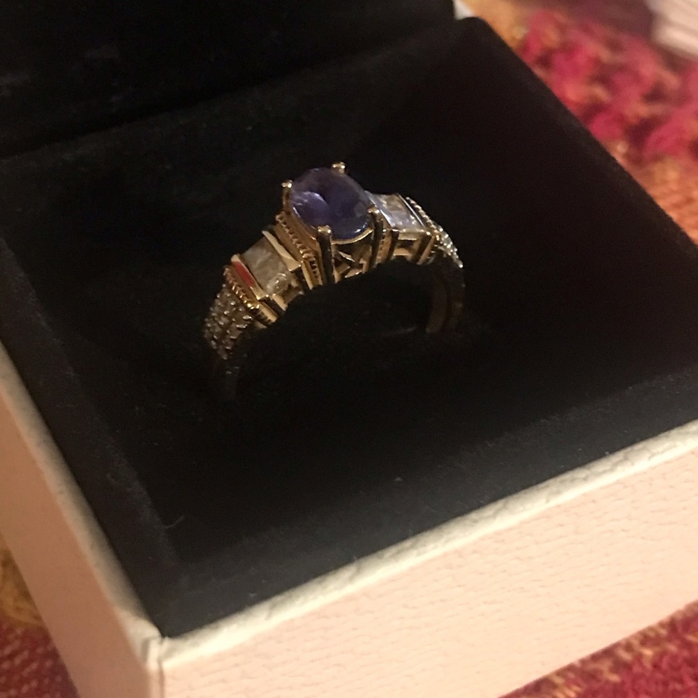 14kt gold Tanzanite and Diamond ring size 8. Tanzanite is 1.02 oval 16 diamonds